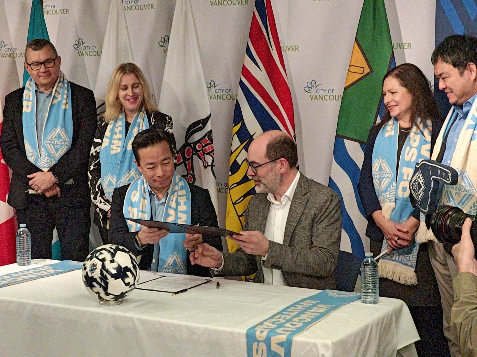 Mayor Sim & Whitecaps FC CEO Axel Shuster signing MOU